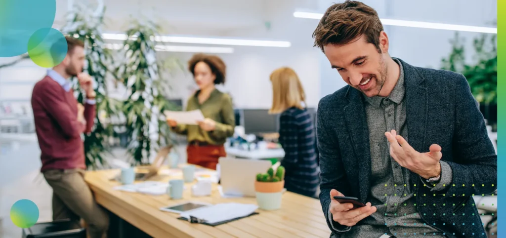 businessman using mobile phone at his workplace