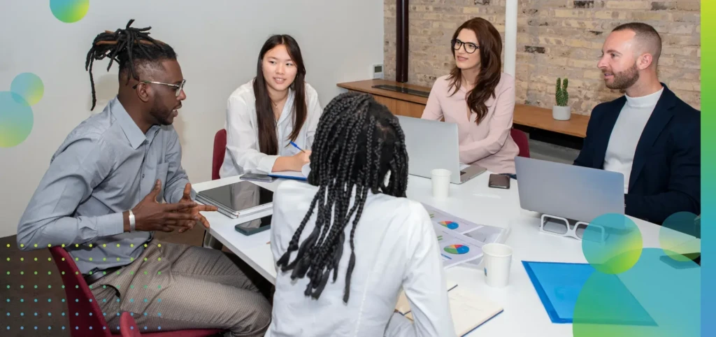 Team of professionals multi ethnic business people negotiating in boardroom.
