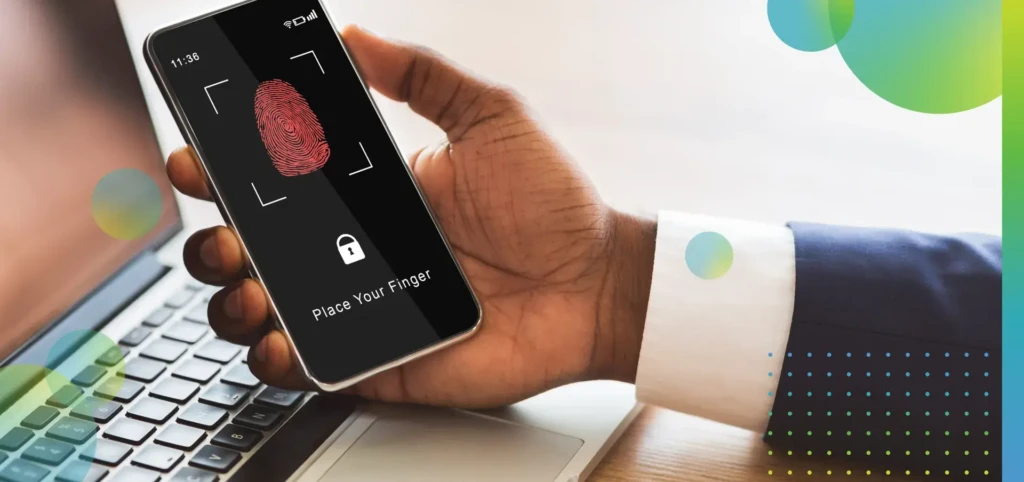 Man holding phone with fingerprint scanning smartphone.