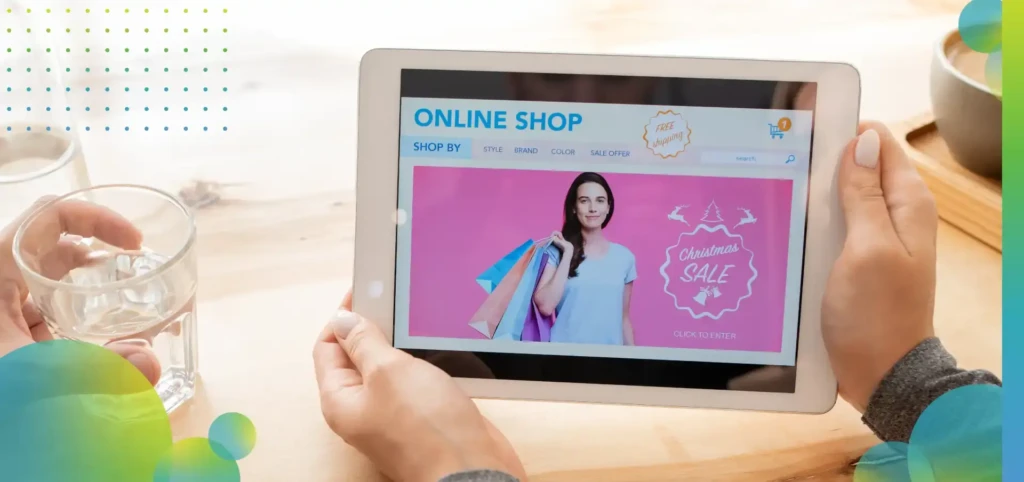 Young female holding digital tablet with online shop home page.