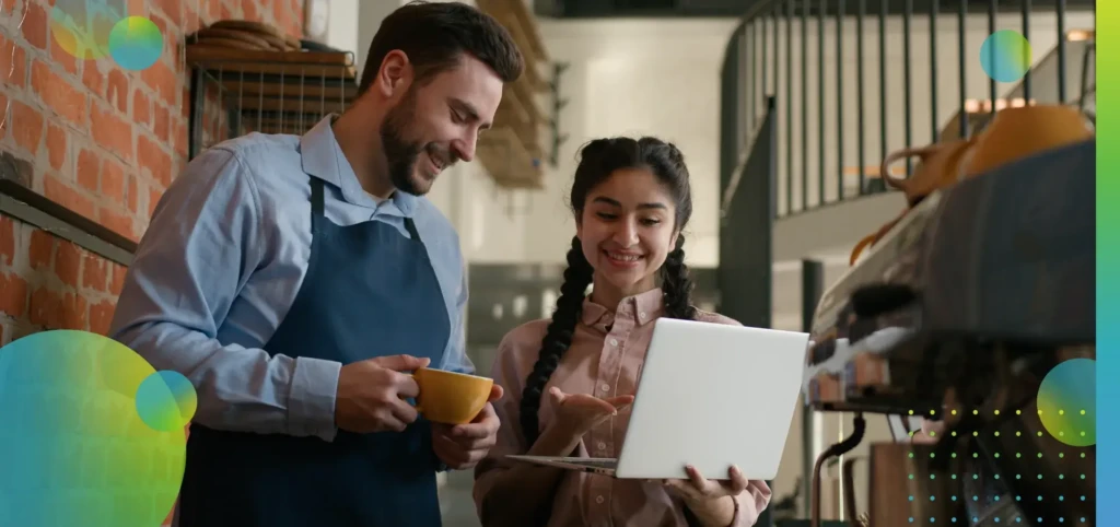 Diverse positive man woman cafeteria employees small business owners cafe manager waiter discussing.