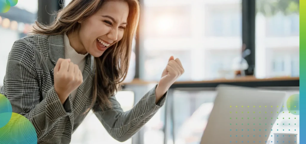 businesswoman using laptop Excited the work came out successfully.