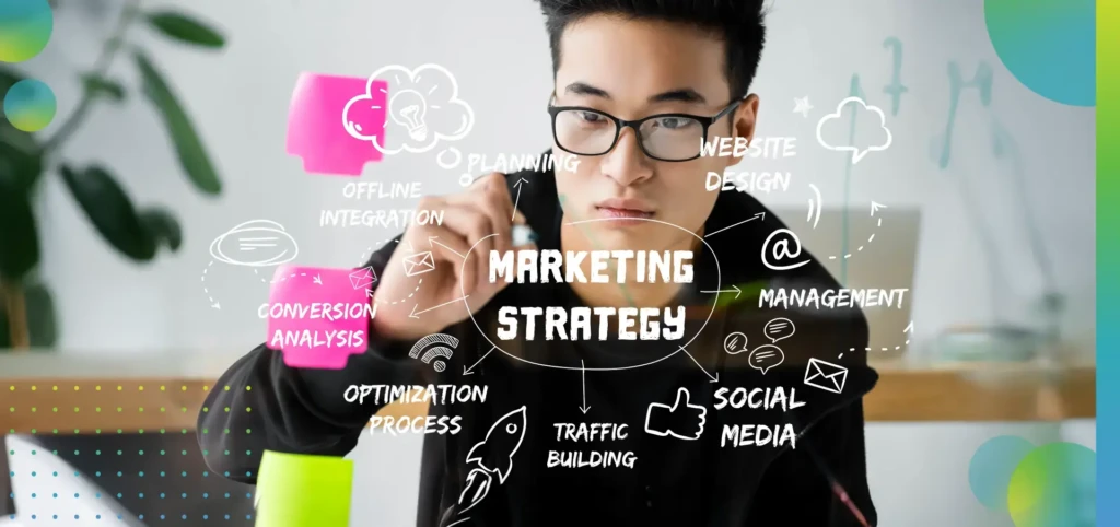 Asian SEO manager writing on glass with illustration of concept words of marketing strategy.