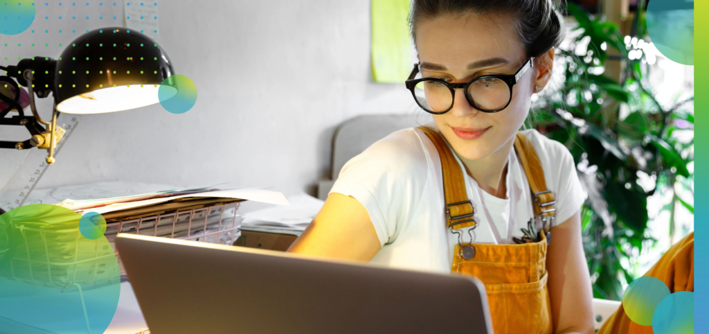 Woman Working at Home on Laptop Computer