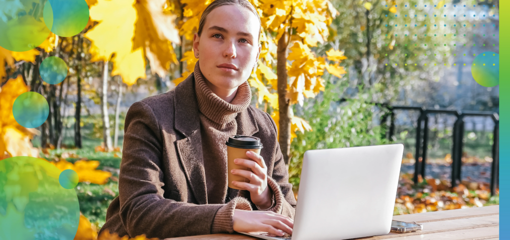 woman working remotely lake laptop.Digital nomad lifestyle,freedom,nature,mindful work