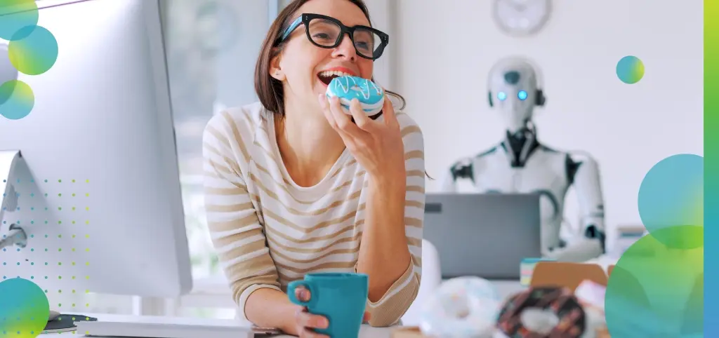 Woman Enjoying a Donut at Her Desk 