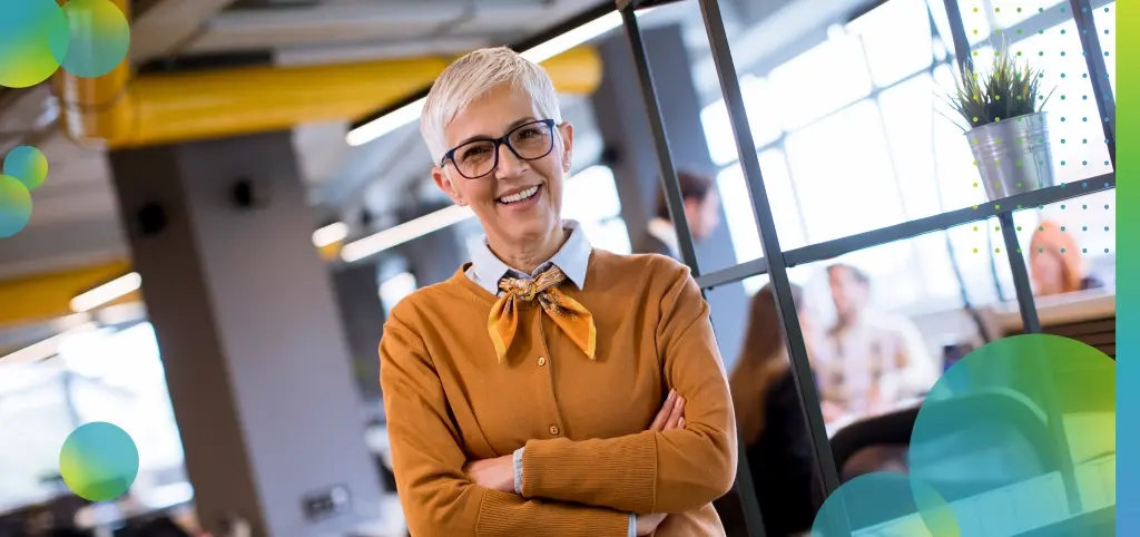 Confident Woman in Modern Office Environment Smiling
